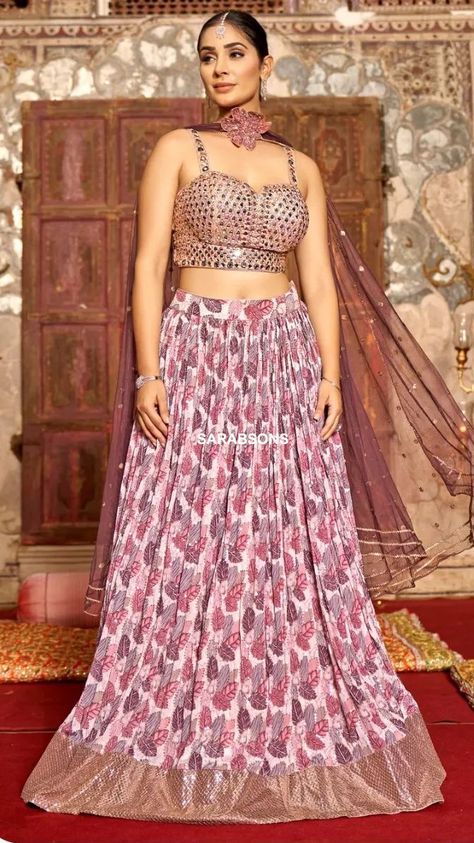 SARABSONS Shop no 101, Naveen Market, Kanpur Spaghetti Strap Crop Top Lehenga in Georgette #chikirpolo #sarabsons #croptop #croptops #croptopdress #lehenga #lehengacholi #croptoplehenga #croptopskirt #croptopandskirt #chaniyacholi #weddinglehenga #partywearlehenga #partywearlehengas #spaghettistrap #strapdress #spaghettistrapdress #indowestern #indowesternstyle #indowesternwear #indowesterndress #indowesterngown #fashion2023 #dresses #partywear #partyweardress #weddingdress #bridesmaiddress #c Drape Sarees, Lehenga Crop Top, Indo Western Gown, Crop Top Lehenga, Spaghetti Strap Crop Top, Indo Western Dress, Strap Crop Top, Crop Top Dress, Party Wear Lehenga