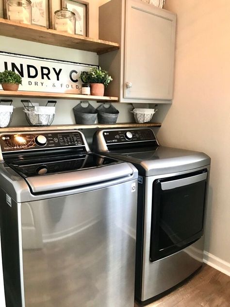 I finally designed my laundry room, it only took 8 years 😆 our dryer was acting up a bit, come to find out after the fact that the duct was clogged! Oh well, I got a new, well deserved (if I say so myself) washer & dryer.   Let’s see... first things first...clear everything out, clean, prep walls, choose paint color, plan and measure where you want everything to go.   I actually had the board and hooks before so that was nice! We bought the board from Home Depot, attached it with a nai… Laundry Room Grey Washer And Dryer, Dark Gray Washer And Dryer Laundry Room, Dark Grey Washer And Dryer Laundry Room, Charcoal Washer And Dryer Laundry Rooms, Magnolia Laundry Room, Laundry Room With Gray Washer And Dryer, Painting Laundry Room Walls, Laundry Room Wall Paint Colors, Top Loading Laundry Room