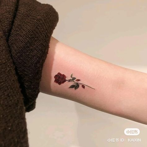 30+ Eye Catching Red Tattoos Ideas And Their Meanings Winter Rose Tattoo, Rose Tattoos Wrist, A Rose Tattoo, Small Rose Tattoo, Red Rose Tattoo, Retro Tattoos, Inspiration Tattoos, Small Girl Tattoos, Gaming Tattoo