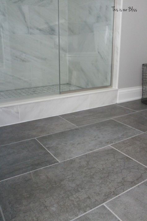 TIOB basement project - basement bathroom - marble tile & gray tile floor - This is our Bliss Gray Tile Flooring, Small Grey Bathrooms, Grey Bathroom Floor, Basement Bathroom Remodeling, Gray Tile, Grey Bathroom Tiles, Marble Tile Bathroom, Grey Floor Tiles, Room Tiles