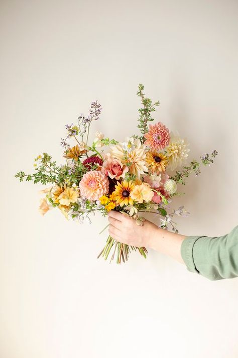 Simple Terracotta Bridal Bouquet, Inexpensive Wedding Arch Ideas, Bouquet Photography Photo Ideas, Pretty Simple Bouquet, Oblong Bridal Bouquet, Wedding Flowers With Carnations, Peach Wildflower Bouquet, Yellow Dahlia Bouquet, Bridal Bouquet Late Summer