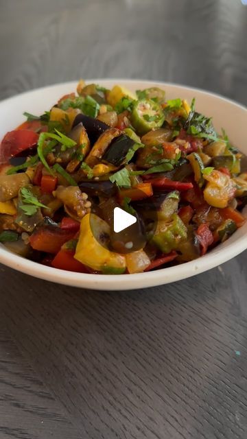 Nicole Nelson McLaughlin on Instagram: "The Best RATATOUILLE!! Get your veggies in with this recipe! #alabama produce made this extra special! #ratatouille #veggierecipes #yum. 
-Peel, cube and salt one eggplant
let it stand for 20 minutes and then pat dry and sauté and olive oil in a hot skillet 
- toss zucchini and squash in olive oil and roasted at 450° until browned
-sauté a half each onion, red and green bell pepper  in olive oil with a little salt. Cook til tender
- add two cloves of minced garlic, 1/4 teaspoon of thyme and crushed red pepper- cook 1 min and add tomatoes. scrape all the brown bits off the bottom of the pan and cook until the tomatoes have softened about three minutes.
-add 1 teaspoon of sugar and 2 teaspoons of white wine vinegar then add in 8 ounces of sliced okra a Zucchini And Squash, Green Bell Pepper, Wine Vinegar, Crushed Red Pepper, White Wine Vinegar, Green Bell Peppers, Okra, Bell Pepper, Red Pepper