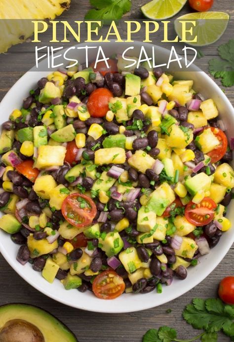 Pineapple Fiesta Salad is sure to be an instant favorite!  It's packed with sweet pineapple chunks, juicy tomatoes, diced avocado and protein packed black beans, then covered in a tangy lime dressing.  Serve this quick & easy Fiesta Salad as a dip, wrap or side and watch it disappear!  Great for parties, potlucks, picnics, meal prep and more!  #fiestasalad #blackbeansalad #pineapple #avocado #veganside #partyfood #veganrecipes #pineapplesalad #blackbeanrecipe #saladrecipe via @WYGYP Fiesta Salad, Medicine Tips, Starch Solution, Pineapple Chunks, Black Bean Salad, Salad Vegan, Pineapple Recipes, Cold Salad, Lime Dressing