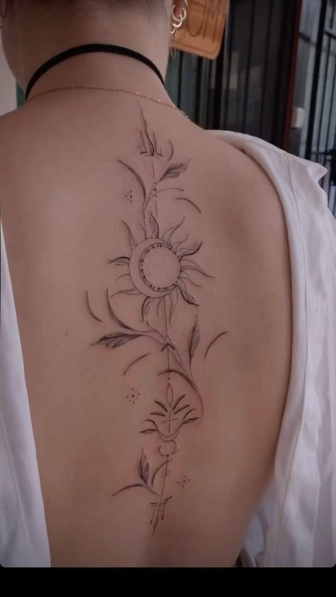 Earthy Spine Tattoos For Women, Sun And Moon Back Tattoo Spine, Tattoos Back Spine, Sun Back Tattoo Women, Sun And Moon Hip Tattoo, Ornamental Spine Tattoos, Sun Moon Flower Tattoo, Earth Spine Tattoo, Celestial Spine Tattoo