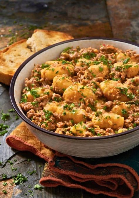 A plate of creamy gnocchi on a table top with fabric napkin. Italian Sausage Gnocchi, Cheeseburger Gnocchi, Autumn Brunch Recipes, Creamy Gnocchi, Sausage Gnocchi, Quick Family Dinners, Ground Pork Recipes, Gnocchi Recipe, Homemade Gnocchi