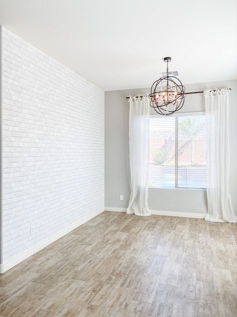 Brick Tile Wall Living Room, Wall Tile Bedroom Ideas, White Brick Living Room Wall, White Brick Room Ideas, Stick On Brick Wall, Room With Brick Wallpaper, Stick And Peel Wallpaper Bedroom, White Brick Accent Wall Living Room, White Brick Wall Living Room Ideas