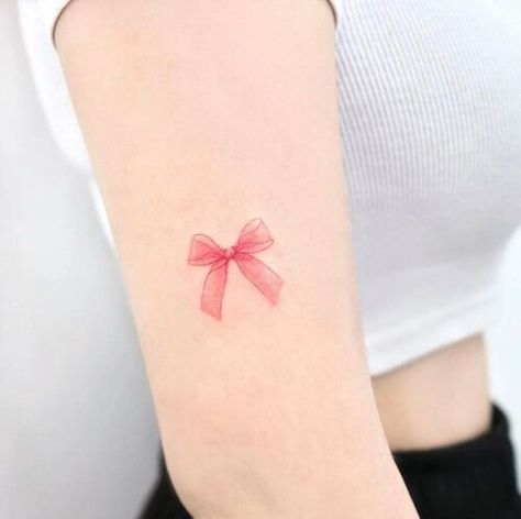 Bow Tattoo Meaning [2023]: Symbolism & 100+ Perfect Bow Tattoo Designs For Women Red Bow Tattoo, Bow Tattoo Ideas, Ribbon Tattoo Designs, Bow Tattoo Thigh, Pink Bow Tattoos, Front Thigh Tattoos, Lace Bow Tattoos, Bow Tattoos, Special Tattoo