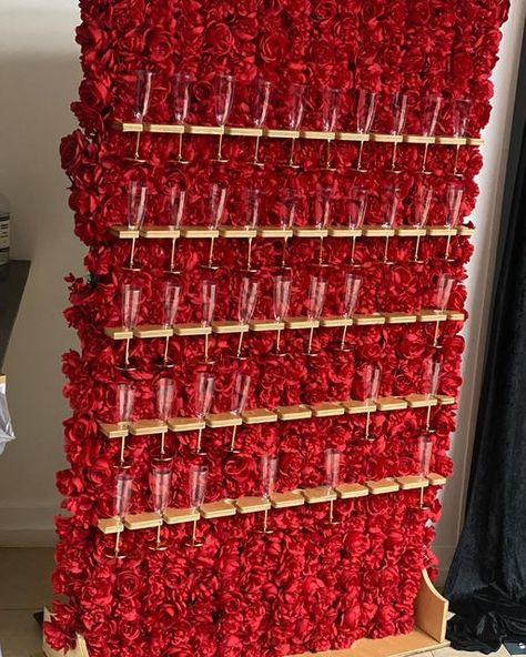 Precious Party Rentals & Decor on Instagram: "Red roses champagne wall was a guest at this 10th wedding anniversary. Thank you to our event planner Sharon for your continual support. #redchampagnewall #champagnewall #preciouspartyrentals #partyrentals #10thweddinganniversary #blacklove #westparkpartyrentals" Ruby Red Anniversary Party Ideas, Red Gala Decor, Ruby Jubilee 40th Birthday Party, 10th Anniversary Party Ideas, Ruby Jubilee, 10th Anniversary Party, Gala Decorations, Jasmine Wedding, Champagne Wall