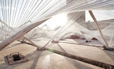 "Loom-Hyperbolic" consists of 3-D volumes woven using only natural, local materials in North Africa #appropriate #cables #wood Temporary Architecture, Canopy Curtains, Covered Balcony, Backyard Canopy, Architecture Wallpaper, Fabric Canopy, Airport Hotel, Wallpaper Magazine, Art Installations