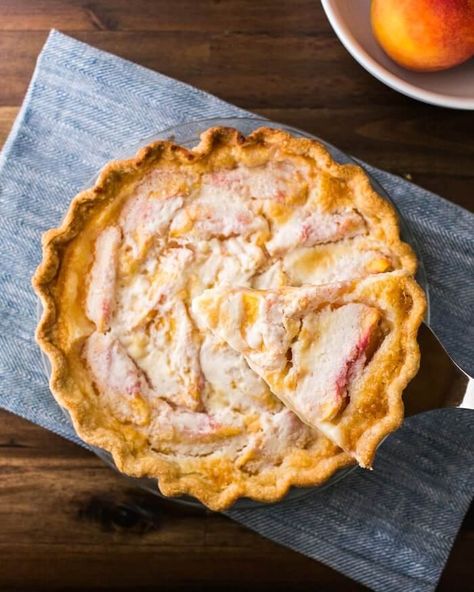 This really is the world's best peach pie recipe. Sweet peaches are covered in creamy custard and baked until set. Serve a la mode or enjoy as is! #dessert #peaches #peachpie #pie #summer Peach Custard Pie, Best Peach Pie, Best Peach Pie Recipe, Peach Custard, Fresh Peach Pie, Peach Pie Recipes, A Couple Cooks, Couple Cooking, Fresh Peaches