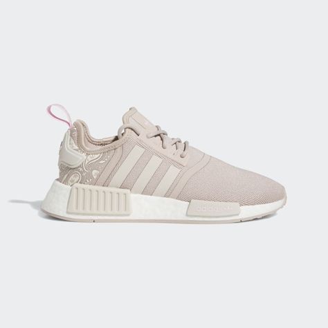 The adidas NMD_R1 has shaped the modern streetwear scene. Ever since it debuted back in 2015, the silhouette has gained global appeal and countless variations. A testament to timeless design, this pair highlights the strengths of the knit textile upper with a paisley print look. All the technical aspects including the responsive BOOST cushioning continue to set the standard for what comfort is meant to be. This shoe's upper is made with a high-performance yarn which contains at least 50% Parley Expensive Things, Adidas Athletic Shoes, Modern Streetwear, Reading Area, Adidas Nmd R1, Nmd R1, Adidas Shop, Adidas Nmd, Shoes Brown