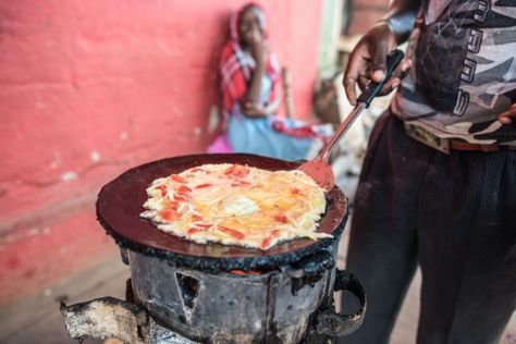 What is Ugandan rolex, a classic street food Veggie Omelet, Fried Dough, Food Stall, Chapati, Media Company, African Food, Omelet, Favorite Snack, Food Festival