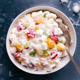 Ambrosia Salad (The BEST Dressing!) | Chelsea's Messy Apron Marshmallow Salad, Ambrosia Fruit Salad, Pistachio Salad, Chelsea's Messy Apron, Full Fat Yogurt, Berry Cheesecake, Ambrosia Salad, Roasted Brussel, Vanilla Greek Yogurt