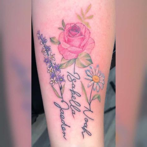 July Birth Flower Tattoos 3 Forearm Tattoo Women Birth Flower, Names Flower Tattoo, Mom Birth Flower Tattoo, Birth Flower Tattoos Ideas Families With Names, March Flower Tattoo With Name, 3 Birth Flower Tattoos, Memorial Flower Tattoo Grandmothers, Birth Flower Sleeve Tattoos For Women, Color Birth Flower Tattoo