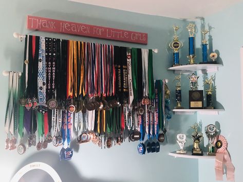 Wall of honor, medals and trophies Medals In Room, Trophies And Medals Aesthetic, Award Wall, Medals And Certificates Aesthetic, Display Trophies And Medals, Sports Medals Aesthetic, Trophy Wall, Medals And Trophies, Dance Trophy Display Ideas