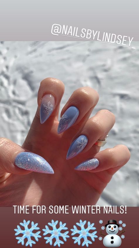 Icy Blue Snowflake Nails, Powder Blue Winter Nails, Blue Chrome Snowflake Nails, Frosty Blue Christmas Nails, Light Blue Christmas Nails Winter, Winter Stilleto Nails Design, Winter Nails Almond Shape Blue, Trending Acrylic Nails Winter, Frosted Nails Winter