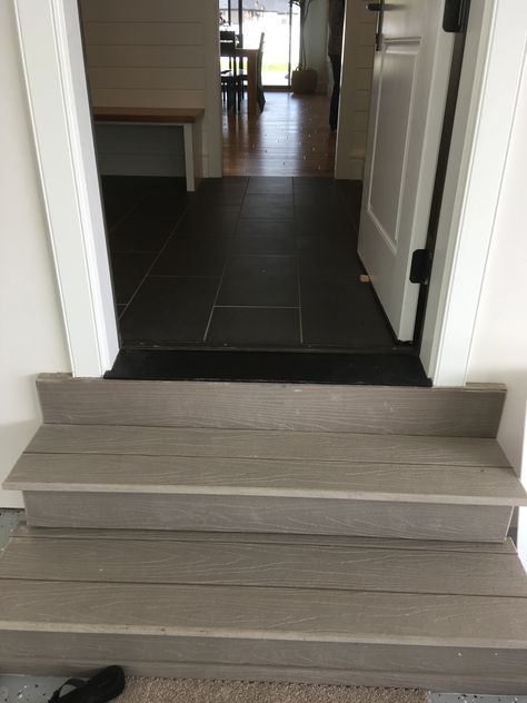 Trex steps in garage Garage Steps Into House, Steps Into House, Garage Steps Into House Ideas, Trex Steps, Entry Way Ideas, Garage Steps, Garage Stairs, Tile Steps, Garage Tile