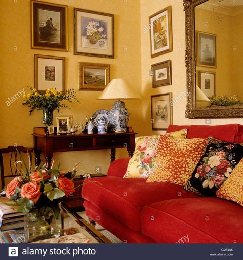 Download this stock image: Patterned cushions on red sofa in living room with a traditional English country interior - C234A6 from Alamy's library of millions of high resolution stock photos, illustrations and vectors. Living Room Red Sofa, Red Couches, Red Sofa Living, Red Sofa Living Room, Red Couch Living Room, Fireplace Cozy, Grey Walls Living Room, Country Style Living Room, Red Living