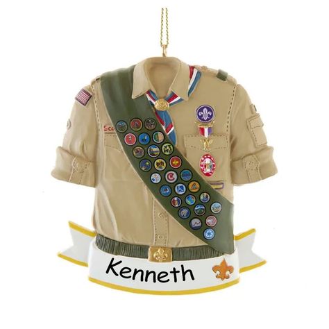 PRICES MAY VARY. Personalize this Eagle Scout Shirt Ornament to show your appreciation to your Boy Scouts Leader, congratulate a member or commemorate an achievement! Beautifully detailed with painted details of patches, pockets, badges and more! Personalization will be handwritten and sure to be a keepsake for years. Ornament measures approximately 3.5 inches and includes attached loop for hanging. Note: Items that are customized specifically for the customer (such as monograms, names, embroide Eagle Scout Display Table, Boy Scout Shirt, Boy Scouts Eagle, Eagle Scout Ceremony, Eagle Scouts, America Eagle, Old World Christmas Ornaments, Tan Shirt, Scout Leader