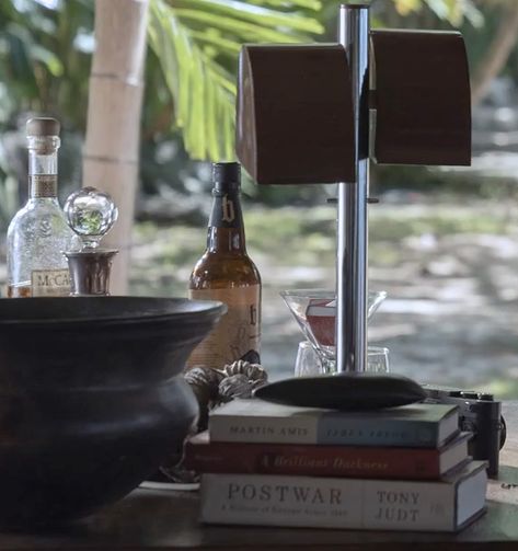 New No Time To Die photo confirms Blackwell Rum and Leica camera at James Bond's apartment | Bond Lifestyle Bond Outfits, Jamaica House, New James Bond, James Bond Style, No Time To Die, Clean Fridge, Island Bar, James Bond Movies, Ian Fleming