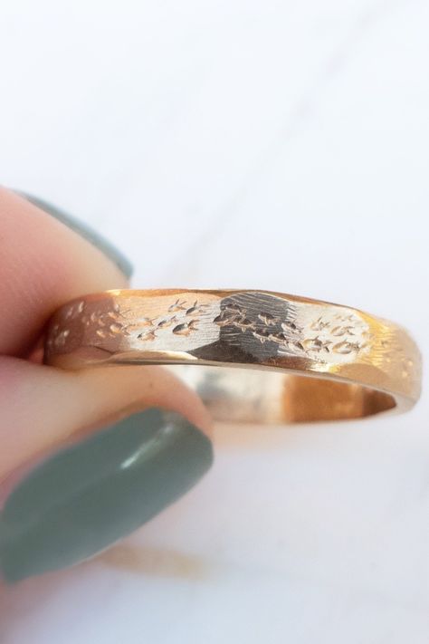 Fish ring handcrafted in 14k gold.  This unique wedding ring makes the perfect ring or gift for an ocean lover or fisherman.  The nature inspired wedding ring has a rustic filed texture, faceted smooth edges, and a school of fish dotting the surface of the ring.  On the inside of the rustic wedding band is a hand carved fish.  The 4mm width gold ring is made of 14k solid gold and is available in white, yellow, or rose gold.   Whether you're looking for a unique wedding band, or gifting yourself Japanese Wedding Band, Carved Wedding Band, Ocean Wedding Ring, Organic Wedding Ring, Fish Wedding, Rustic Wedding Band, Textured Wedding Ring, Ocean Wedding Theme, Nature Inspired Wedding Ring