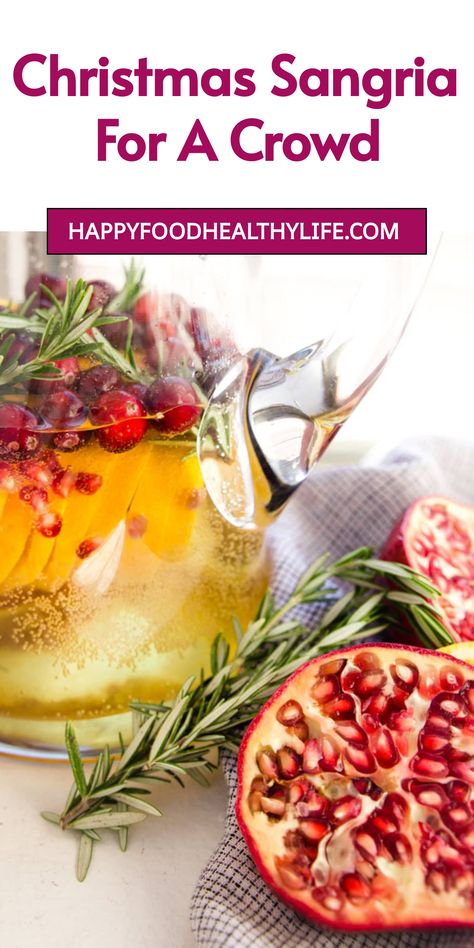 Looking for a fun and festive drink to serve at your Christmas gathering? Try this Christmas Sangria recipe! It's super easy to make and it looks so pretty with all the colorful fruits. This holiday sangria is perfect for both kids and adults to enjoy together. Plus, you can easily customize it with your favorite ingredients.  | christmas sangria with vodka | Holiday Sangria Christmas | White Sangria Recipe For A Crowd | Pino Grigio Sangria, Christmas Sangria With Prosecco, Holiday White Sangria Recipe, Sangria With Vodka, White Christmas Sangria Recipe, Recipe For Sangria, Sangria Christmas, Holiday Sangria Recipes, Christmas Sangria Recipes