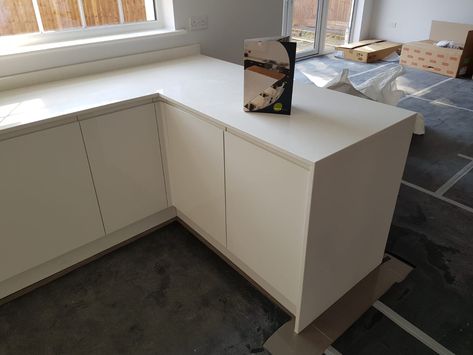 Installed 03/09/18 The stunning and popular quartz which is the Bianco Marmo Suprema was chosen to complete this kitchen. We fabricated a u-shape worktop with an end panel to create a lovely breakfast bar. Upstands and windowsill were added to finish the look too. Rose Plant Care, Tiny Living, Window Sill, Storage Bench, Breakfast Bar, Bar, Furniture, Home Decor, Home Décor