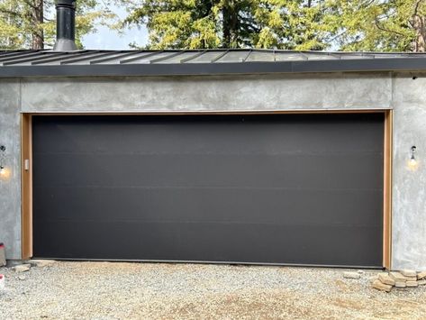 Modern Garage Door Styles - Door Pros Rustic Modern Garage Doors, Scandinavian Garage Door, Modern Garage Door Makeover, Flat Panel Garage Door, Modern Garage Door, Black Garage Door, Garage Door Panels, Commercial Garage Doors, Modern Garage Doors