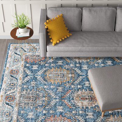 This area rug features a classic pattern and purposeful fading for a boho look. It's power-loomed from polypropylene thats' stain-resistant for everyday use. The design features traditional Oriental rug motifs with fun florals and geometric shapes. The blue, ivory, and light brown color palette is rich but distressed for a relaxed, vintage-inspired feel. We love the medium 0.5'' pile height that provides plenty of cushion - great for cozy spaces like your bedroom or den. Roll it out with a rug p Cozy Dog Bed, Brown Color Palette, Nursery Furniture Sets, Persian Pattern, Teen Bedding, Brown Area Rug, Rocker Recliners, Medallion Design, Blue Square