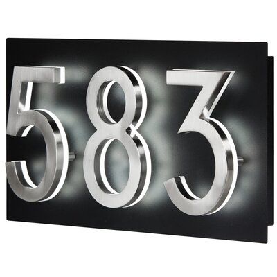 The address plaque for LED backlit numbers will add more functionalities and complete the look of the numbers. It features a dusk-to-dawn light sensor for automatic ON/OFF. Easy to install: Simply connect the plaque to any household electrical box (120V) like an outdoor light fixture. Made with high-quality galvanized steel and powder-coated paint, this plaque will resist harsh weather conditions. The numbers are mounted using 1/2-inch spacers, so the light is projected onto the address plaque f Outdoor Light Fixture, Solar House Numbers, Illuminated House Numbers, Best Solar Lights, House Letters, Modern House Number, House Number Plaque, Solar House, Address Numbers