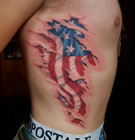 Flag skin tear American Flag Rib Tattoo, Rib Cage Tattoos For Men, Tear Tattoo, Skin Tear Tattoo, Skin Tear, Scratch Tattoo, Lincoln Portrait, Ripped Skin Tattoo, Firefighter Tattoo