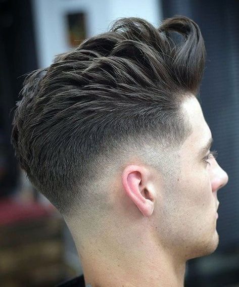 Textured Tousled Pompadour with Skin Fade. This handsome men's pompadour hairstyle is flattering, cool and incredibly stylish. Men’s Pompadour Haircut, Haircut Pompadour, Men’s Hairstyles Pompadour, Pompadore Haircut Men Pompadour, Messy Pompadour, Skin Fade Pompadour, Short Pompadour, Pompadour Men, Pompadour Fade