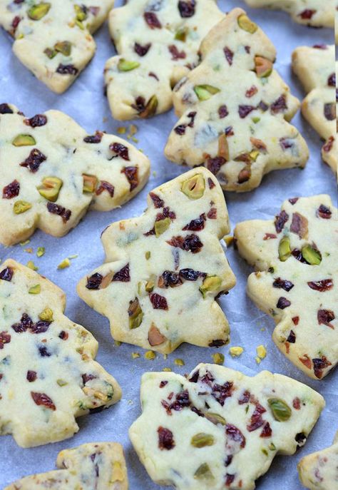 Bunch of Cranberry Pistachio Christmas Shortbread Cookies on a white paper. Christmas Tree Shortbread Cookies, Pistachio Cut Out Cookies, American Christmas Cookies, Pistachio Christmas, Christmas Shortbread Cookies, Pistachio Shortbread, Easy Shortbread, Easy Dessert Recipes Christmas, Shortbread Cookies Christmas