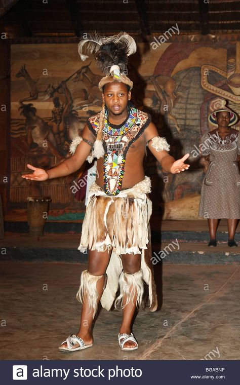 Download this stock image: Young zulu man & group dancing wearing traditional beady dress. Close up shoot. Lesedi Village, South Africa, November, 2009 - BGABNF from Alamy's library of millions of high resolution stock photos, illustrations and vectors. Zulu Traditional Attire For Men, Zulu Traditional Attire, Nature Magic, African Crafts, Traditional Attire, Zulu, Traditional Clothing, Dance Wear, Traditional Outfits