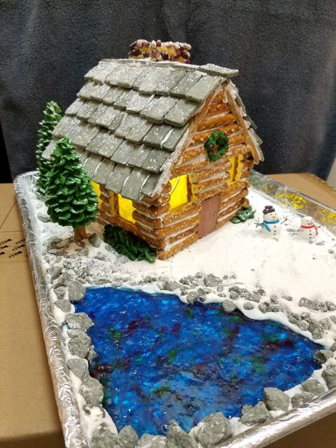 Had fun making this with large pretzel log, jolly rancher lake and frosting snowmen Pretzel Cabin, Gingerbread House Designs, Gingerbread House Decorations, Christmas Gingerbread House, Jolly Rancher, Cabin In The Woods, Christmas Gingerbread, Cabins In The Woods, In The Woods