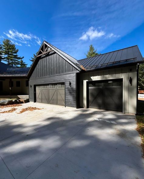 Turn your farmhouse dreams into reality with black overlay garage doors 🐄🌾 Our Overlay Carriage House style is available in steel (shown), wood, AND fiberglass 📜🙀 📸: 715 Garage Door Co. Modern Farmhouse Garage Doors, Grey Garage Door, Farmhouse Garage Doors, Garage Doors Black, Modern Farmhouse Garage, Carriage Garage, Grey Garage, Carriage Garage Doors, Farmhouse Garage