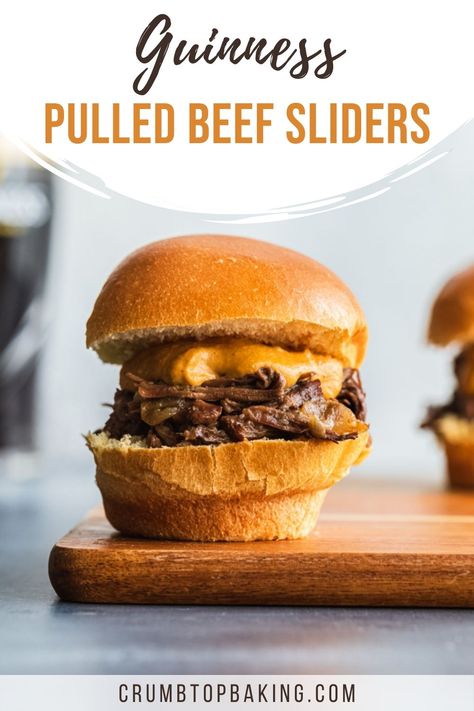 Close up of a Guinness pulled beef slider topped with cashew cheese sauce and placed on a wooden board. Pulled Beef Sliders, Beer Braised Beef, Sliders Recipes Beef, Beef Dip, Pulled Beef, Beef Sliders, Scottish Recipes, Crockpot Roast, Beef Stew Meat