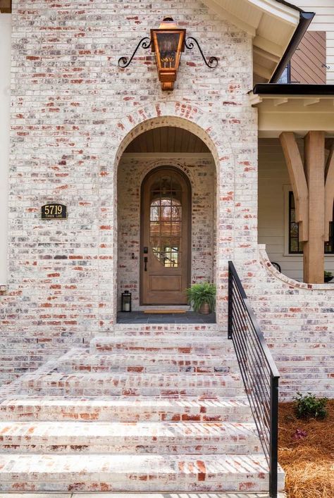 This triple gable European Tudor home designed by Frusterio Design and Pike Properties is located in Charlotte, North Carolina. Pike Properties, Castle On A Hill, Tudor Home, French Country Front Porch, Side Entrance, Painted Brick House, Modern Rustic Homes, Brick Exterior House, Tudor House