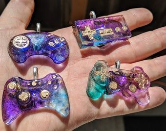 Computer ornaments | Etsy Handmade Games, Video Game Controllers, Resin Jewelry Diy, Game Controllers, Video Game Controller, Epoxy Resin Crafts, Epoxy Resin Art, Diy Resin Art, Unique Diy Gifts