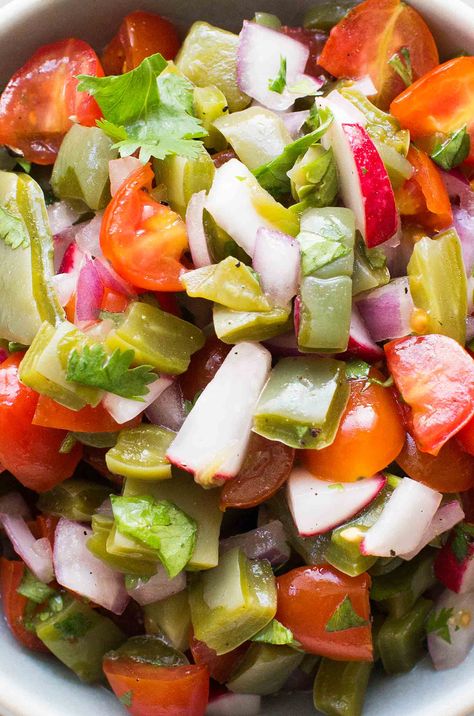 Ever eat cactus? Nopalitos are so GOOD! This easy, budget-friendly salad is a classic Mexican cactus salad with chopped prickly pear cactus paddles (nopalitos), tomatoes, onions, and radishes. On SimplyRecipes.com Alkaline Salad, Nopales Salad, Nopalitos Recipe, Bites Ideas, Nopales Recipe, Prickly Pear Recipes, Cactus Recipe, Cactus Salad, Pirate Cove