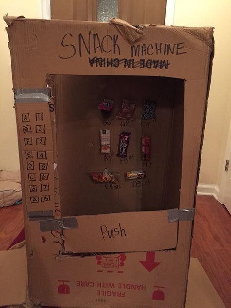 Make a snack vending machine out of a cardboard box for practicing money with the kiddos! Snack Vending Machine, Vending Machine Snacks, Vending Machine, Cardboard Box, Liquor Cabinet, Snacks, Money, Education, Canning