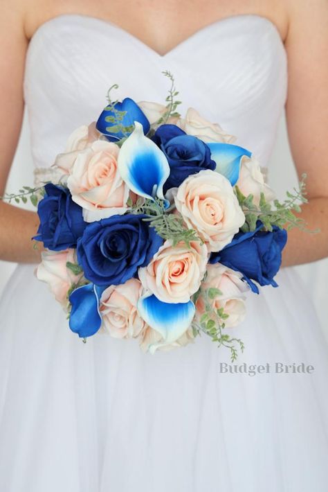 This is a round bouquet with royal blue roses, peach roses accented with royal blue halo calla lilies and greenery Royal Blue Wedding Theme, Peach Wedding Bouquet, Round Bouquet, Brides Bouquet, Royal Blue Wedding, Unique Wedding Flowers, Blue Themed Wedding, Pink Bride, Blue Wedding Flowers