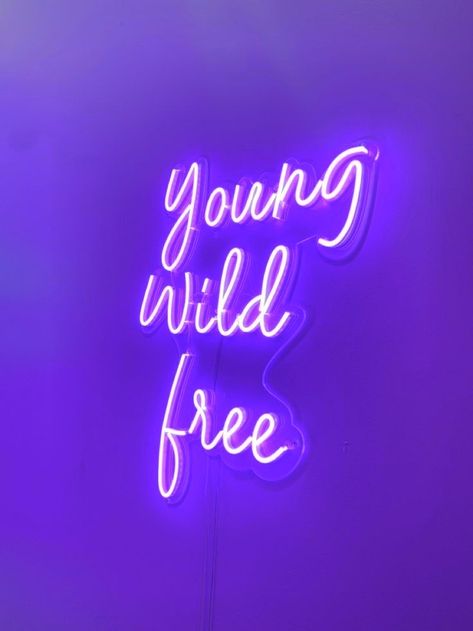 Purple aesthetic neon sign "young wild free" on a wall Purple College Aesthetic, Young Wild Free Aesthetic, Young Wild And Free Aesthetic, Purple Aesthetic Neon, Purple Neon Sign, Aesthetic Neon, Young Wild Free, Purple Neon, College Dorm Room Decor