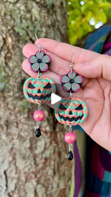 Cathryn ✨ BlueBassoon Handmade on Instagram: "Harlequin pumpkins!!!!! 🎃🎃🎃🎃🎃🎪🎪🎪🎪🎪

I’ve been thinking about clowncore ever since I made that little striped flower cane and the idea for this beaded flower pumpkin earring literally came to me like a gift from the divine 🤩

This earring was a big stretch for me design-wise and I was a nervous wreck through the whole making process, but once I pieced them together this morning I breathed a sigh of relief and pride because they are even better than I imagined 🥰🎃

And of course the pumpkins themselves turned out so incredibly fabulous that I decided to make some just by themselves too! 

Dropping 10/5/24 at 6pm EDT along with a small coven of other fabulous Halloween designs 👻💋🖤

#clowncore #circuscore #harlequin #pumpkinjewelry # Goo Goo Muck, Flower Pumpkin, Pumpkin Jewelry, Sigh Of Relief, Pumpkin Flower, Polymer Clay Jewelry Diy, Pumpkin Earrings, Halloween Designs, Clay Jewelry Diy