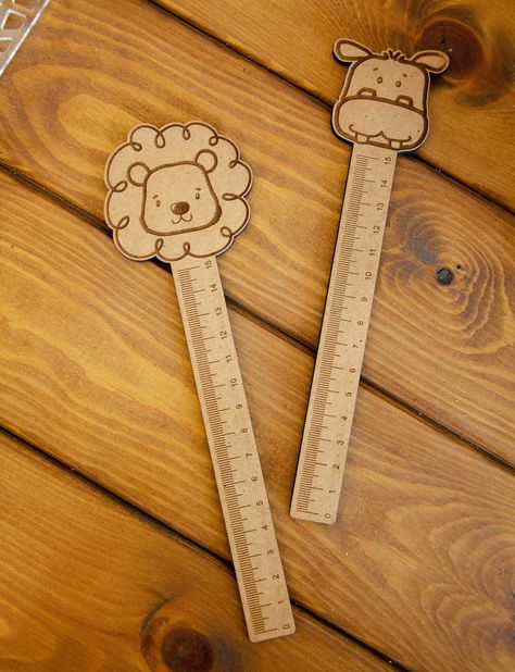 A 15 cm animal theme ruler made of HDF wood and engraved with laser cut.  It can also be used as a bookmark! Ideal for birthday and party gifts as well as student's gifts! It comes in 3 different animal designs: Donkey, Lion and Elephant.  You can order a package including all three or just choose the one you like best! Please contact us if you have any questions about this item! Thank you! Laser Printing Ideas, Wood Laser Cut Ideas, Glowforge Crafts, Wooden Presents, Lion And Elephant, Laser Gifts, Mdf Design, Wood Laser Ideas, Diy Laser Cut