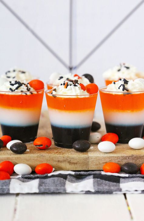 These Halloween Jello Shots are a tasty and fun way to celebration All Hallow’s Eve. With the layers of color and flavor, they will be a huge hit at any Halloween party! Black Jello Shots, Kid Friendly Halloween Party, Jello Shooters, Halloween Jello Shots, Jello Shot Cups, Halloween Jello, Camping Drinks, Jell O Shots, Jello Cups