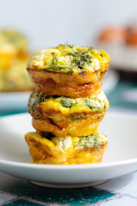 These Zucchini Egg Muffins are the perfect make ahead breakfast and they're freezer-friendly! They're made with sauteed zucchini, feta cheese, and lots of fresh herbs. The prep is super easy and you can serve them for breakfast or as a snack on-the-go. They're delicious both hot and cold, healthy, quick, and easy! Zucchini Egg Muffins, Best Workout Playlist, Salmon Pesto Pasta, Pesto Tortellini Salad, Zucchini Egg, Zucchini Breakfast, Mango Pineapple Smoothie, Zucchini Feta, Pesto Tortellini