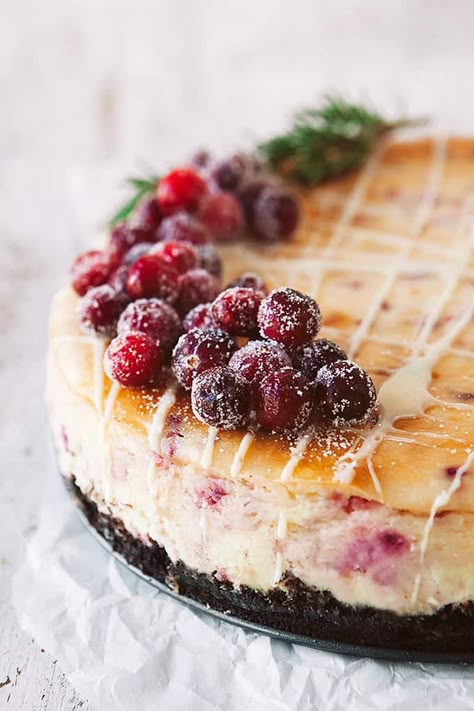 Cranberry White Chocolate Cheesecake is perfect for the holidays. Thanksgiving to Christmas and New Year's Eve it will be a show stopper of a dessert! New Years Cheesecake, Light Holiday Desserts, Cranberry White Chocolate Mousse Cheesecake, Cranberry White Chocolate Tart, Cheesecake White Chocolate, Beautiful Christmas Desserts, White Chocolate And Cranberry Tart, Cranberry White Chocolate Cheesecake, Christmas Chocolate Desserts