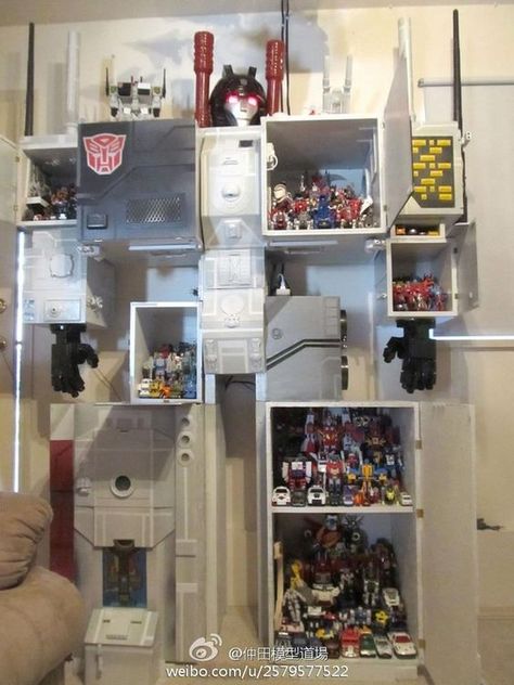 Metroplex Shelving Unit - Transformers Display -- the most awesome way to display Transformers that I've ever seen! (and also the most appropriately sized Metroplex, ever!): Transformers Display, Transformers Costumes, Transformers Figures, Custom Transformers, Generation Gap, Display Counter, Transformers Collection, Solve The Problem, Out Of Space