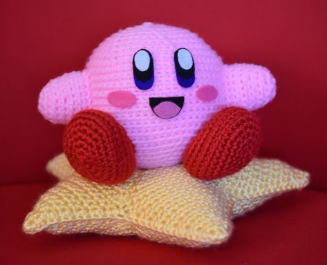 Amigurumi Kirby with crocheted star pillow Crochet Kirby, Kirby Party, Nintendo Crochet, Crocheted Star, Mario Crochet, Star Pillow, Crochet Geek, Crochet Cat Pattern, Crochet Stars